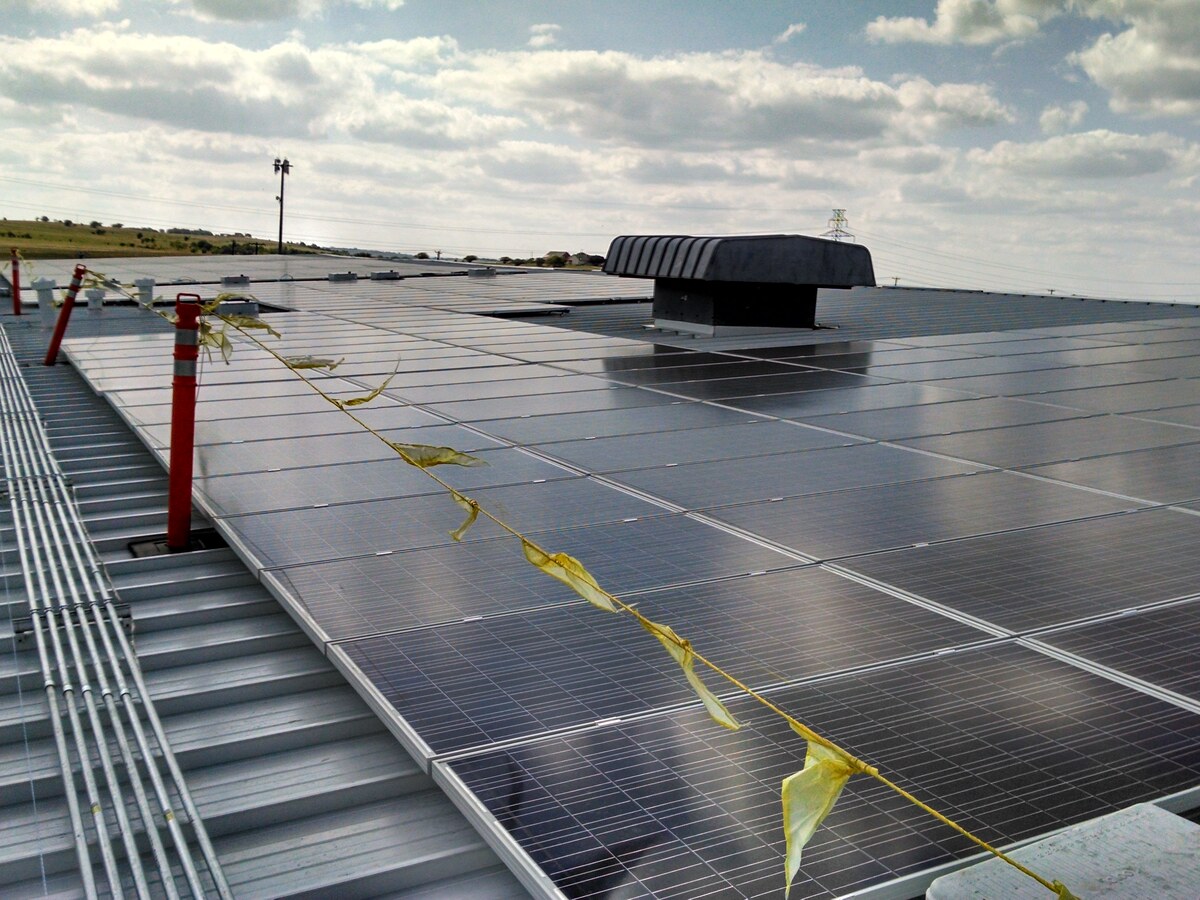 Commercial rooftop solar panel installation by KDR Electric Services